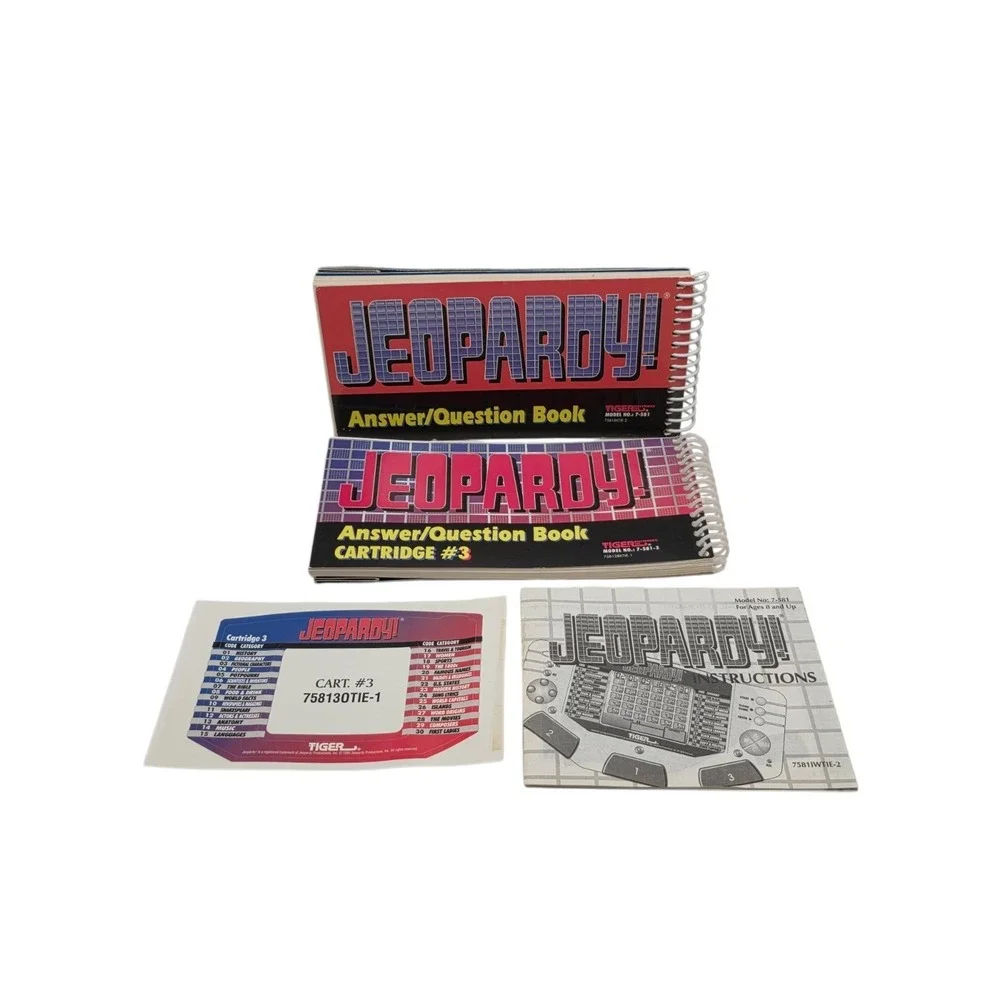 Tiger Electronics Jeopardy Hand Held Game With Cartridges & Answer Question Book